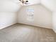 Carpeted bedroom with natural light and a ceiling fan at 8005 Mcgarry Trl, Charlotte, NC 28214
