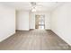 Living room features natural light and open space to the dining area at 8005 Mcgarry Trl, Charlotte, NC 28214