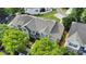 Aerial view of home with well-maintained landscaping, mature trees, and a newer roof at 8009 Whitehawk Hill Rd, Waxhaw, NC 28173
