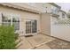 Inviting back patio features a retractable awning, and sliding glass doors at 8009 Whitehawk Hill Rd, Waxhaw, NC 28173
