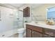 Bathroom with glass shower and vanity at 8009 Whitehawk Hill Rd, Waxhaw, NC 28173