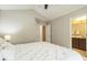 Bright bedroom featuring a soft, neutral palette and easy access to the ensuite bathroom at 8009 Whitehawk Hill Rd, Waxhaw, NC 28173