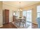 Cozy dining room with natural light and a sliding glass door leading to outdoor area at 8009 Whitehawk Hill Rd, Waxhaw, NC 28173