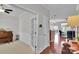 Open foyer showcasing hardwood floors, wainscoting and entry to office and open living area with lots of light at 8009 Whitehawk Hill Rd, Waxhaw, NC 28173