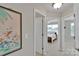 Hallway featuring neutral paint and access to multiple rooms at 8009 Whitehawk Hill Rd, Waxhaw, NC 28173