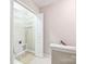 Bright laundry room features wire shelving for optimal storage convenience at 8009 Whitehawk Hill Rd, Waxhaw, NC 28173