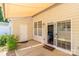 Private outdoor patio with sliding glass door access and awning at 8009 Whitehawk Hill Rd, Waxhaw, NC 28173