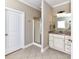 This primary bathroom features a shower and vanity with granite countertop at 816 Springs Rd, Dallas, NC 28034