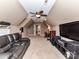 Spacious bonus room with TV, lounge chair, and neutral carpet at 816 Springs Rd, Dallas, NC 28034