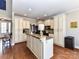 Spacious kitchen featuring custom cabinets, granite counters, and ample storage at 816 Springs Rd, Dallas, NC 28034