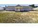 Backyard with a covered patio, offering an ideal space for outdoor seating, barbecues, and relaxation at 867 Meadow Hill Ct, Lincolnton, NC 28092