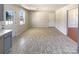 Spacious room featuring tile floors, neutral walls, and exterior access at 867 Meadow Hill Ct, Lincolnton, NC 28092