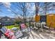 Inviting back deck with comfortable seating and backyard views at 9239 Silver Pine Dr, Charlotte, NC 28277