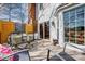 Outdoor back deck with dining area, glass door access, and backyard view at 9239 Silver Pine Dr, Charlotte, NC 28277