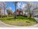 Charming two-story brick home features a manicured lawn and mature landscaping at 9239 Silver Pine Dr, Charlotte, NC 28277