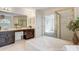 Luxurious main bathroom featuring a soaking tub, shower, and double vanity sinks at 9239 Silver Pine Dr, Charlotte, NC 28277