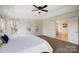 Spacious main bedroom with en-suite bathroom access and ample natural light at 9239 Silver Pine Dr, Charlotte, NC 28277