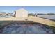 Open backyard with a partially covered patio, offering plenty of space and privacy at 1000 Sweetgum St, Gastonia, NC 28054