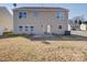 Expansive backyard featuring a patio and well-maintained lawn, ideal for outdoor activities at 1000 Sweetgum St, Gastonia, NC 28054