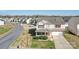 Charming two-story home showcasing a well-manicured lawn and appealing curb appeal at 1000 Sweetgum St, Gastonia, NC 28054