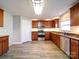 Well-appointed kitchen with stainless steel appliances, ample cabinetry, and convenient access to living spaces at 1000 Sweetgum St, Gastonia, NC 28054
