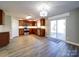 Modern kitchen with stainless appliances, granite countertops, and seamless flow to outdoor spaces and living area at 1000 Sweetgum St, Gastonia, NC 28054