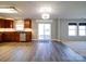 Bright, open living space features wood floors, recessed lighting, and sliding glass doors to the outdoor area at 1000 Sweetgum St, Gastonia, NC 28054