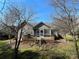 Inviting backyard deck area with screened-in porch and access to the outdoor space at 104 Johnsbury Dr, Stanley, NC 28164