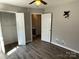Inviting bedroom featuring spacious closet and hard surface floors, ready for comfort and style at 104 Johnsbury Dr, Stanley, NC 28164