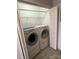 Efficient laundry room with washer, dryer, shelving and space-saving design, perfect for modern living at 104 Johnsbury Dr, Stanley, NC 28164