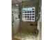 New step-in shower with glass enclosure, mosaic tile accents, and convenient grab bars at 104 Johnsbury Dr, Stanley, NC 28164