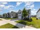 Beautiful two-story home with a manicured front yard and a tree in the front at 1120 Freeman View Dr, Albemarle, NC 28001