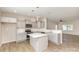 Modern kitchen with gray cabinets, white countertops, stainless steel appliances, and central island at 1120 Freeman View Dr, Albemarle, NC 28001