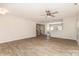 Spacious living room featuring wood-look floors and open floor plan with access to the kitchen at 1120 Freeman View Dr, Albemarle, NC 28001