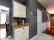 Cozy kitchen nook with white cabinets, granite countertops, and modern stainless-steel appliances at 12729 Mcginnis Ln, Huntersville, NC 28078