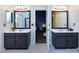 Beautiful main bathroom with dual vanities, modern mirrors, and ample lighting at 12729 Mcginnis Ln, Huntersville, NC 28078