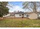 Cozy backyard features a fire pit and detached shed at 133 2Nd Ave, China Grove, NC 28023
