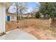 View of the fenced in backyard and shed at 133 2Nd Ave, China Grove, NC 28023