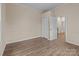 Comfortable bedroom featuring updated flooring and neutral colors, offering a blank canvas for personalization at 133 2Nd Ave, China Grove, NC 28023
