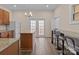 Open kitchen layout featuring stainless appliances, a center island, and bar-style seating by the window at 133 2Nd Ave, China Grove, NC 28023