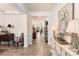 Elegant foyer with hardwood floors, wainscoting, and stylish decor at 141 Rhuidean Ct, Troutman, NC 28166