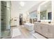 Spacious bathroom features a soaking tub, walk-in shower, double vanity, and modern finishes at 1711 Brook Rd, Charlotte, NC 28205
