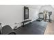 Spacious exercise room with gym flooring, a treadmill, and workout equipment at 1711 Brook Rd, Charlotte, NC 28205