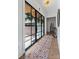 Inviting foyer features hardwood floors, large front windows, and modern decor at 1711 Brook Rd, Charlotte, NC 28205