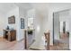 Upstairs hallway boasts hardwood floors and views of the bedrooms at 1711 Brook Rd, Charlotte, NC 28205