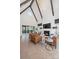 Bright and airy living room with vaulted ceilings and large windows for natural light at 1711 Brook Rd, Charlotte, NC 28205