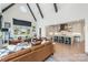 Open-concept design featuring a living room flowing seamlessly into a modern kitchen with a large central island at 1711 Brook Rd, Charlotte, NC 28205