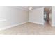 Large bonus room with tile flooring, neutral walls, and ample space for entertaining or relaxation at 178 Harper Lee St, Davidson, NC 28036