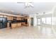 Bright kitchen featuring custom wood cabinets, an island, and stainless steel appliances at 178 Harper Lee St, Davidson, NC 28036