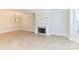 Bright living room featuring tile flooring, a fireplace, and large windows, creating an inviting atmosphere at 178 Harper Lee St, Davidson, NC 28036